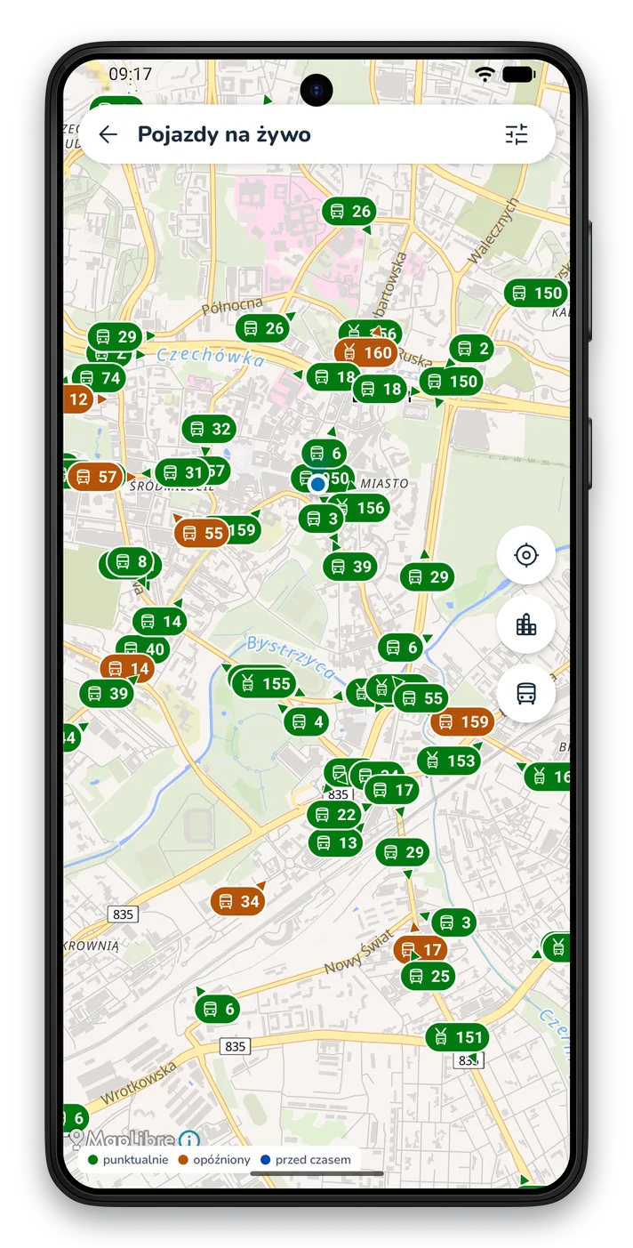 Mapa miasta z pojazdami komunikacji miejskiej; każdy znacznik pokazuje numer linii i strzałkę kierunku jazdy, na dole legenda: punktualnie, opóźniony, przed czasem